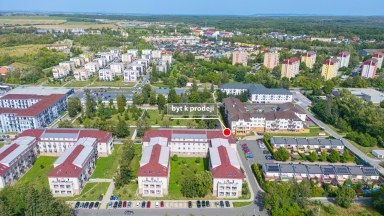 Prodej novostavby podkrovního bytu 3+kk s parkovacím stání v Milovicích (okr. Nymburk)